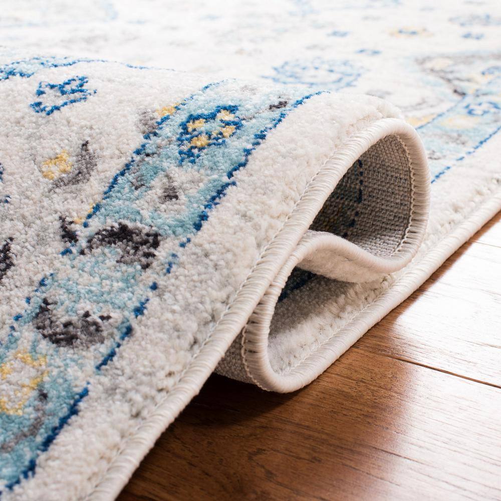 Ivory and Light Blue Floral Synthetic 9' x 12' Rectangular Area Rug