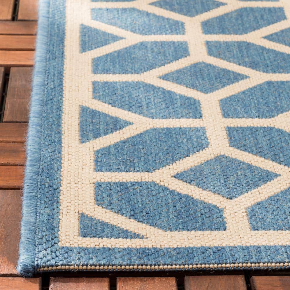 Blue and Creme Geometric Synthetic Indoor/Outdoor Accent Rug 2'-2" x 4'