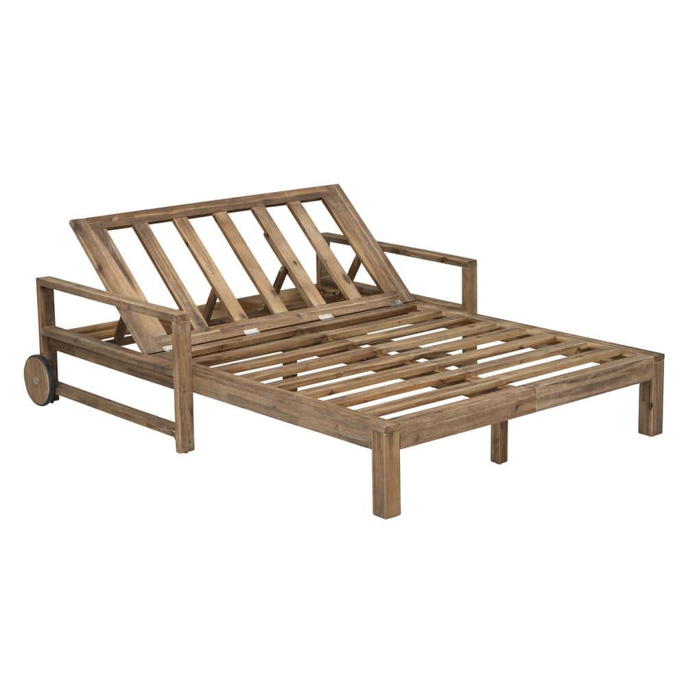 Zeus & Ruta brown wooden outdoor lounge chair frame without cushions.