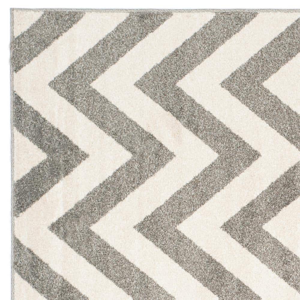 5' x 5' Dark Grey and Beige Reversible Synthetic Area Rug