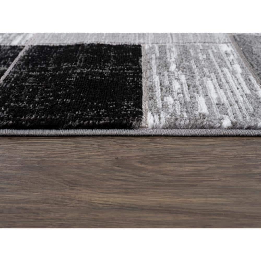Black and Gray Geometric Synthetic 5' x 7' Area Rug