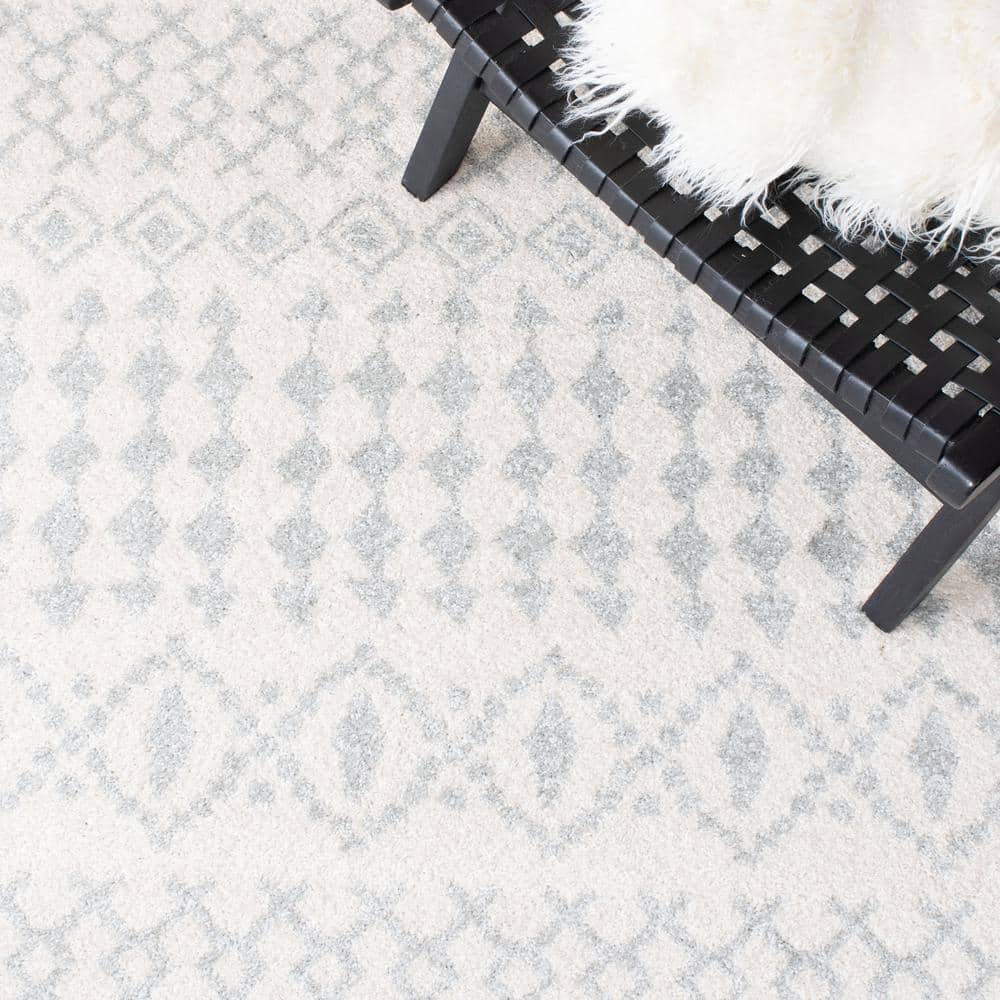 Ivory and Terracotta 79" Square Hand-Knotted Easy-Care Area Rug