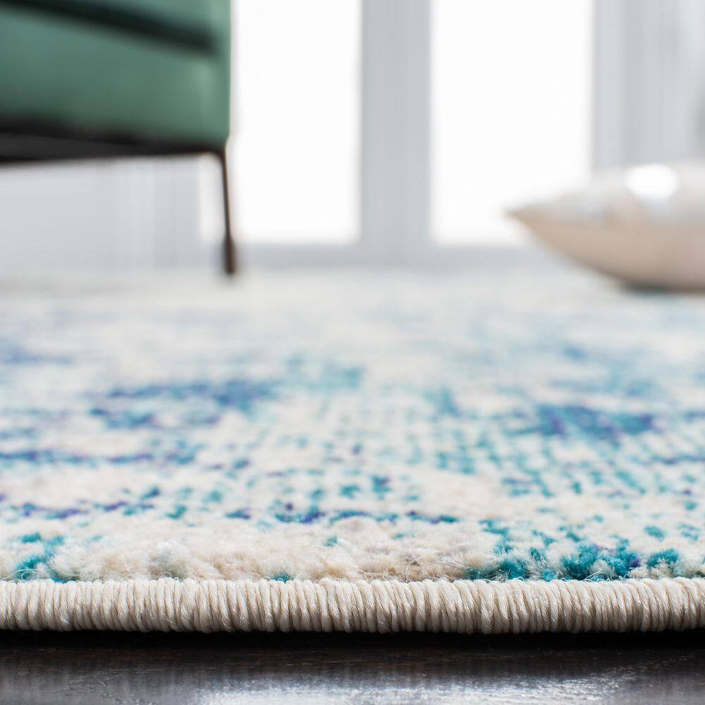 Ivory and Turquoise Square Abstract Synthetic Area Rug