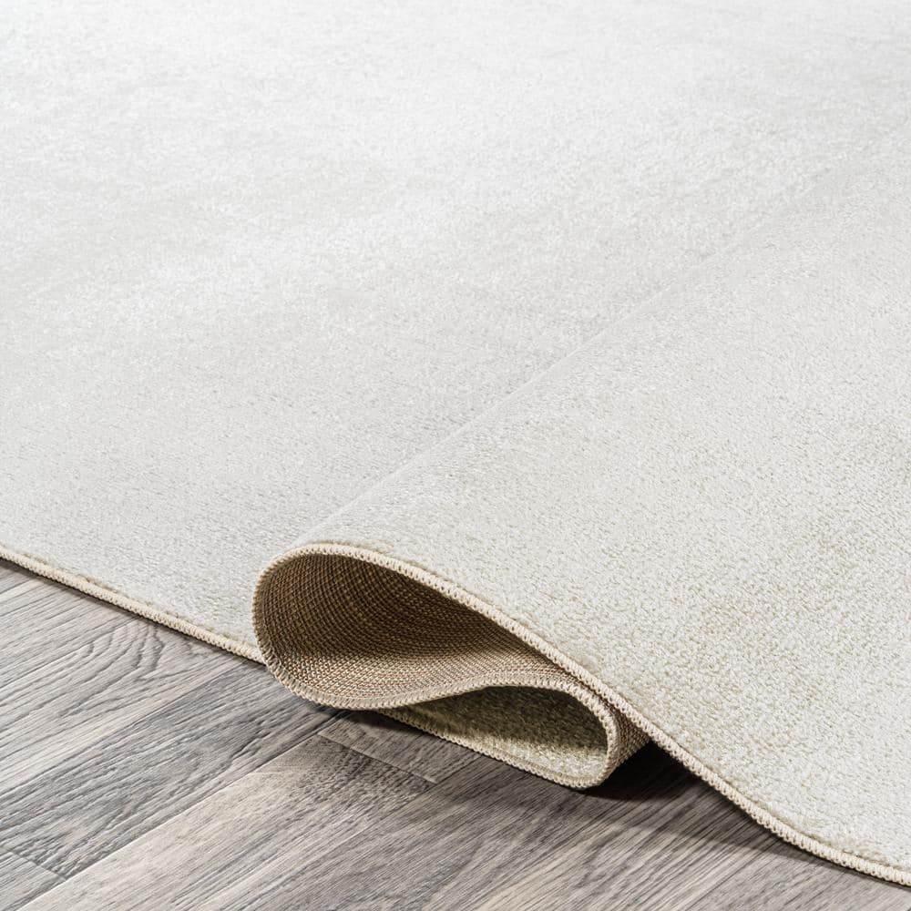 Cream 4' x 6' Synthetic Washable Rectangular Area Rug