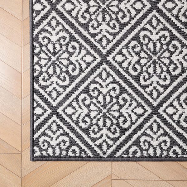 Austell 2-Tone Dark Grey/Ivory 2 ft. x 6 ft. Geometric Polypropylene Runner Rug