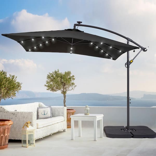 Sonkuki 8.2 ft. x 8.2 ft. Cantilever Solar LED Lighted Square Patio Umbrella With a Base in Black