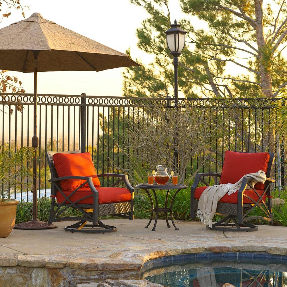 Gray Aluminum Frame Swivel Chair with Red Cushions