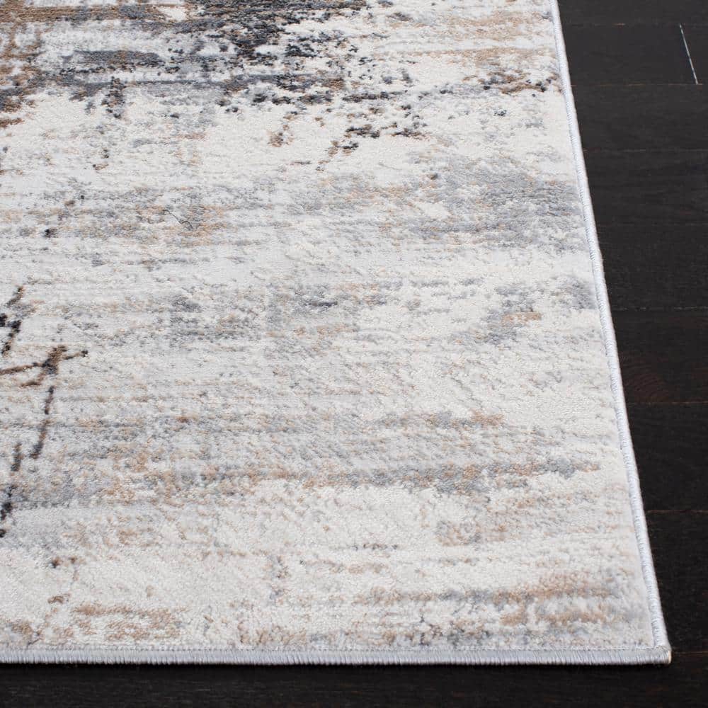 Ivory and Gray Abstract 8' x 10' Stain-Resistant Rug