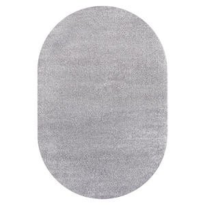 Haze Solid Low-Pile Gray 6 ft. x 9 ft. Oval Area Rug