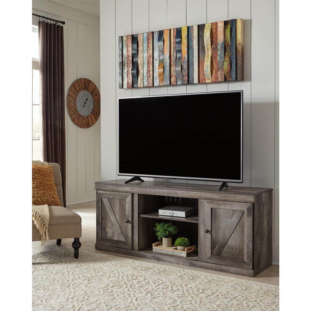 Wynnlow Gray TV Stand Fits TV's up to 69 in. with Shelf