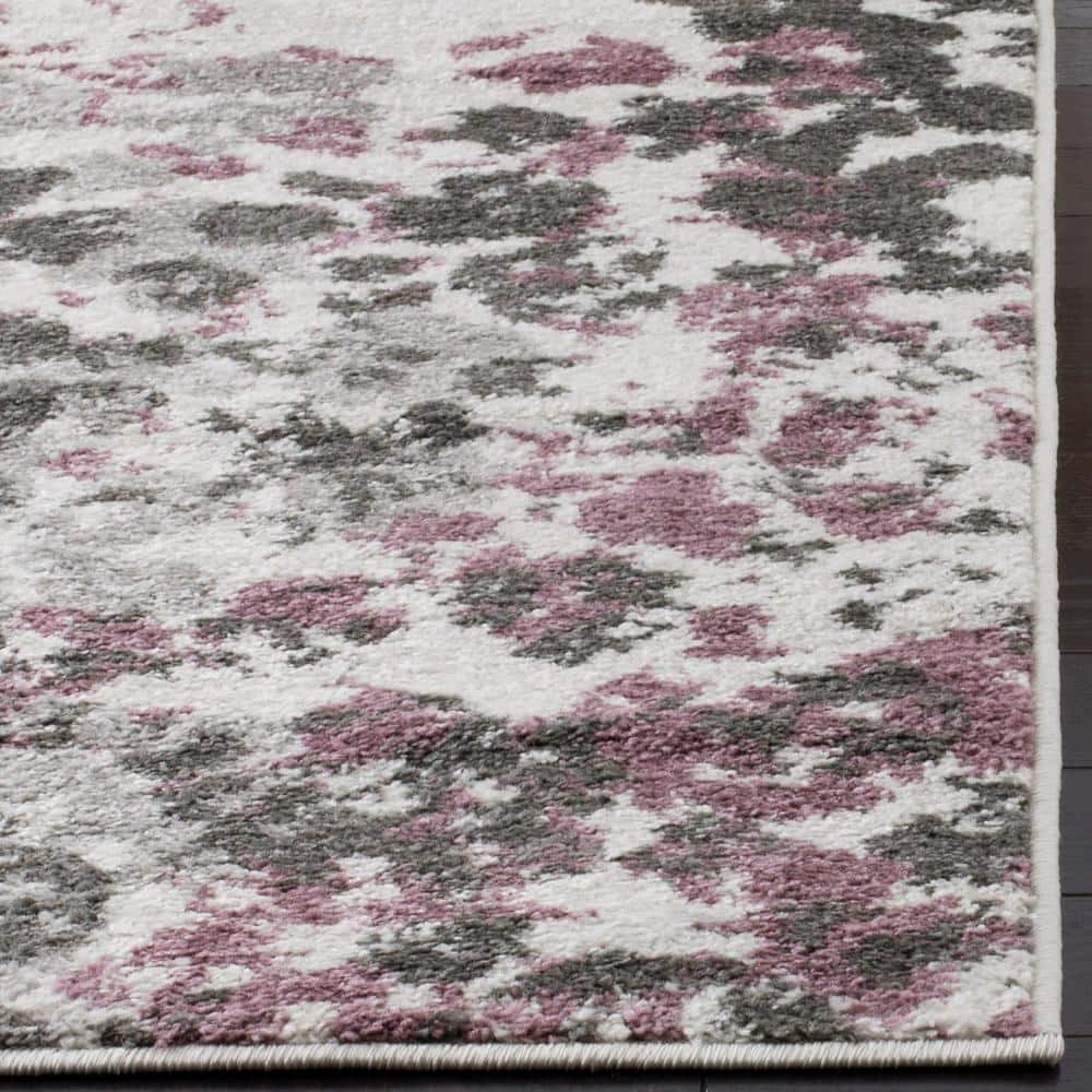 Ivory and Purple Floral Synthetic Area Rug, 6' x 9'