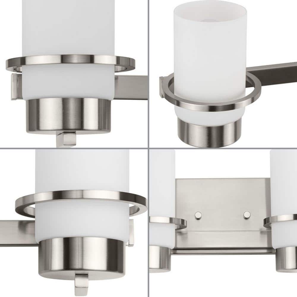 Reiss Brushed Nickel 4-Light Vanity with White Glass Shades