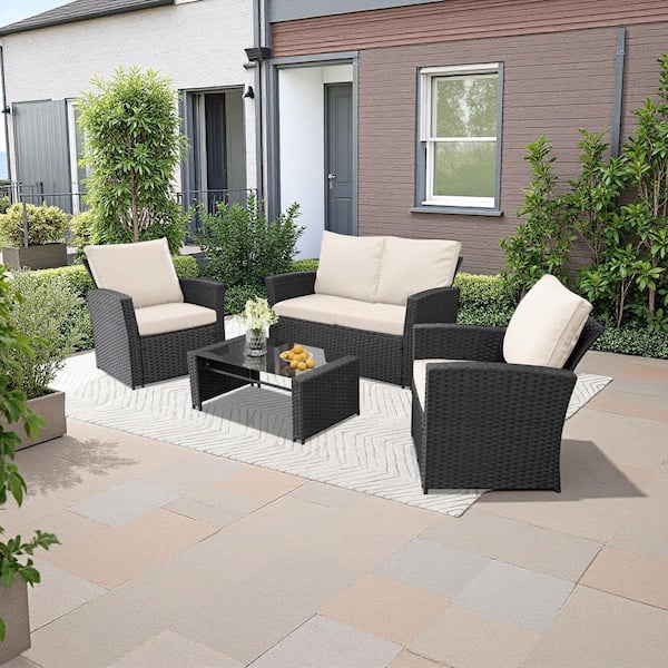 4-Piece Black Wicker Outdoor Furniture Sectional Set with Glass Table and Beige Cushions