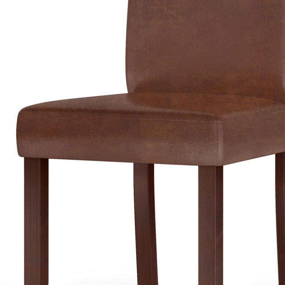 Distressed Saddle Brown Faux Leather 9-Piece Dining Set with Solid Rubberwood Table