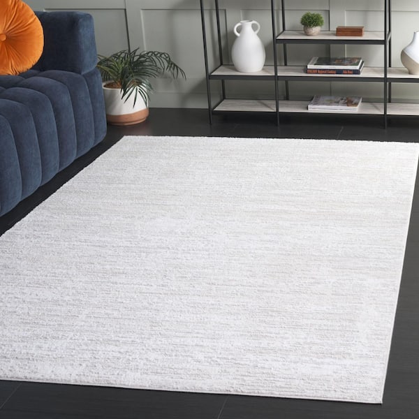 Carter 5 ft. x 8 ft. Ivory/Taupe Distressed Abstract Area Rug