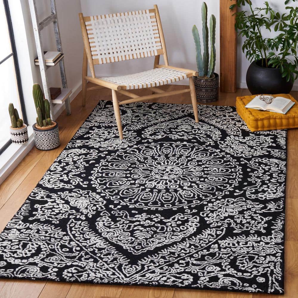 Black and Ivory Floral Hand-Tufted Wool 6' x 9' Area Rug