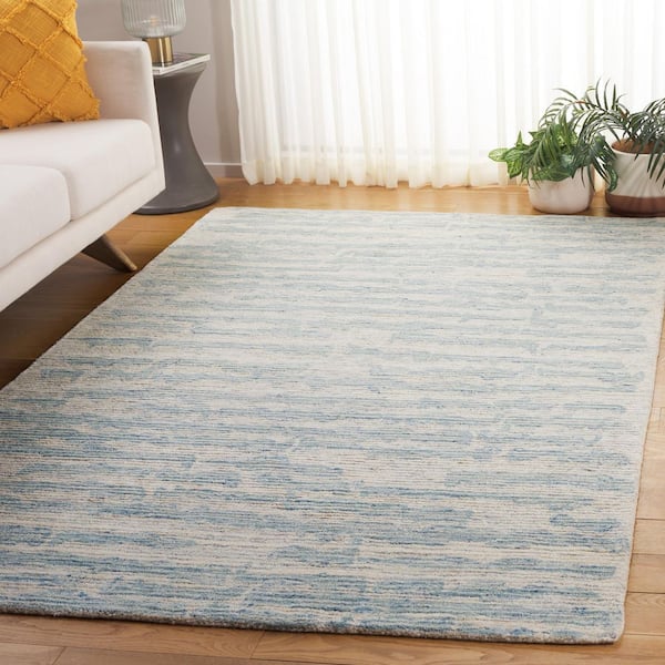 Ebony 3 ft. x 5 ft. Ivory/Light Blue Abstract Swirl Striped Area Rug