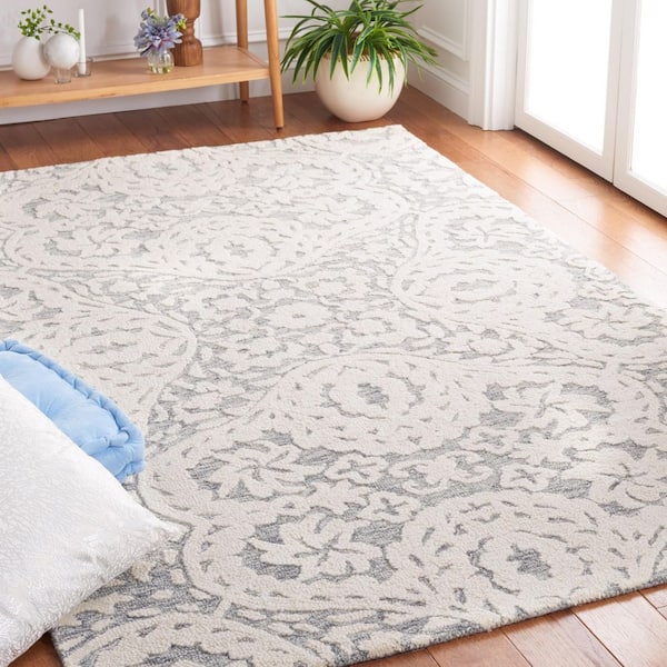 Metro 6 ft. x 9 ft. Ivory/Gray Floral High-Low Area Rug