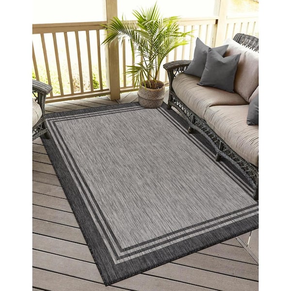 https://images.thdstatic.com/productImages/03822651-6ab5-4559-9cf9-a54886af5488/svn/silver-pebble-outdoor-rugs-hd-alh60262-6x9-76_600.jpg