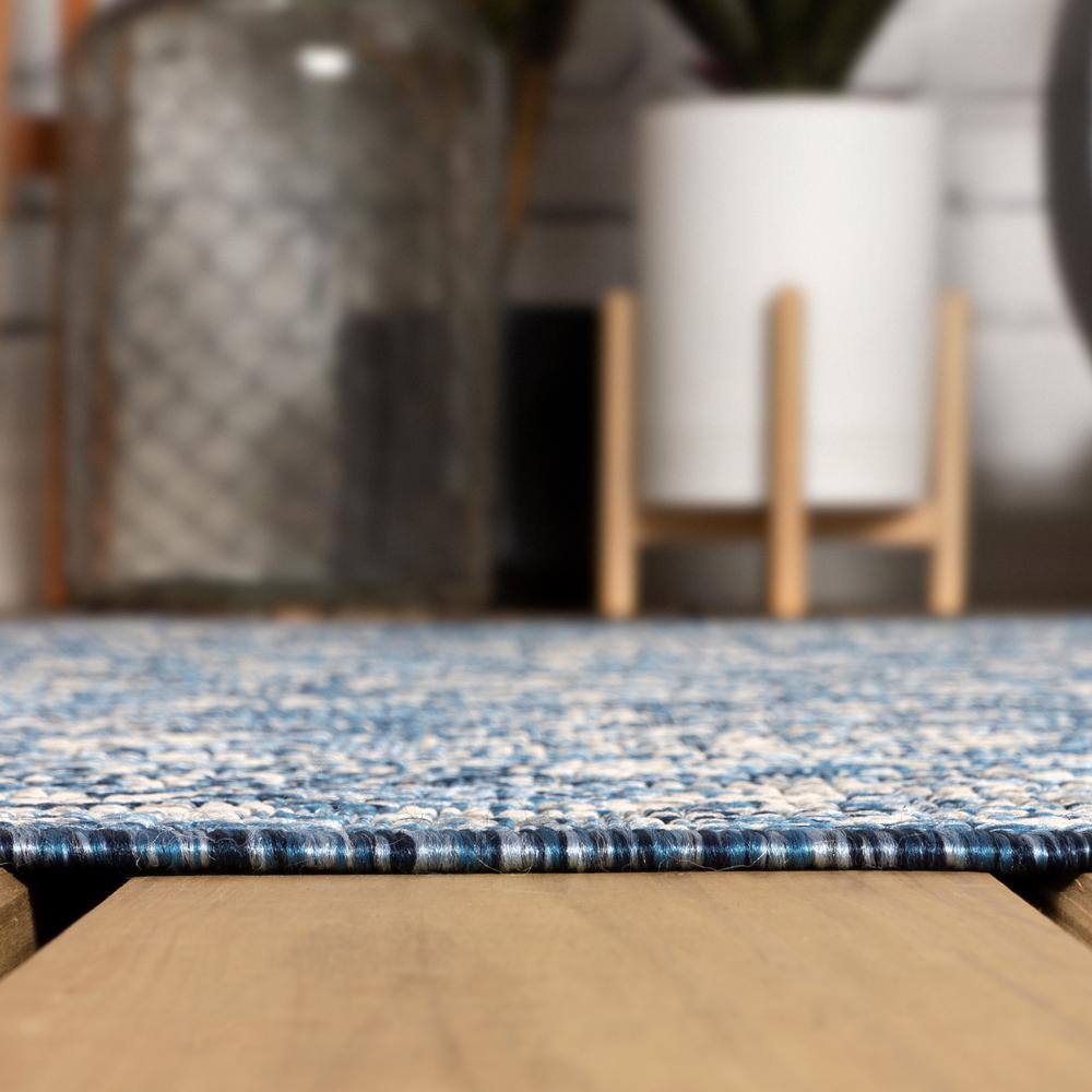 Navy and Gray Floral Synthetic 4' x 6' Reversible Area Rug