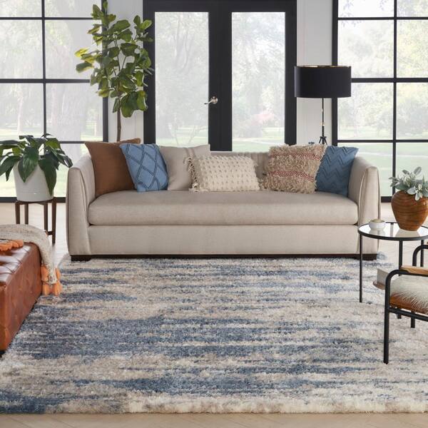 https://images.thdstatic.com/productImages/038cf6cd-5fe6-53f0-a37a-6aa6696c3e89/svn/light-blue-grey-nourison-area-rugs-005335-4f_600.jpg