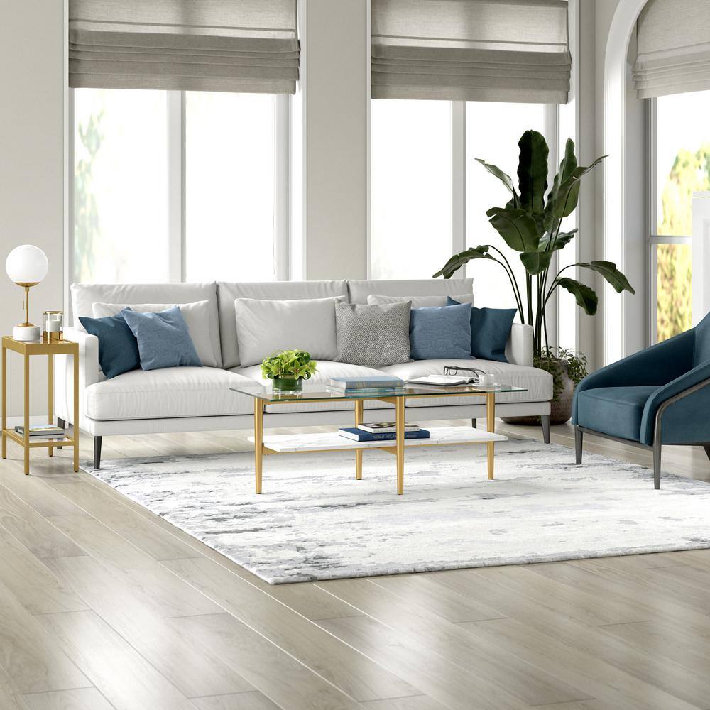 Otto 47" Brass Rectangular Coffee Table with Faux Marble Shelf