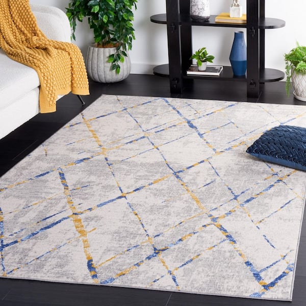 Odyssey 4 ft. x 6 ft. Gray/Blue Gold Distressed Geometric Area Rug