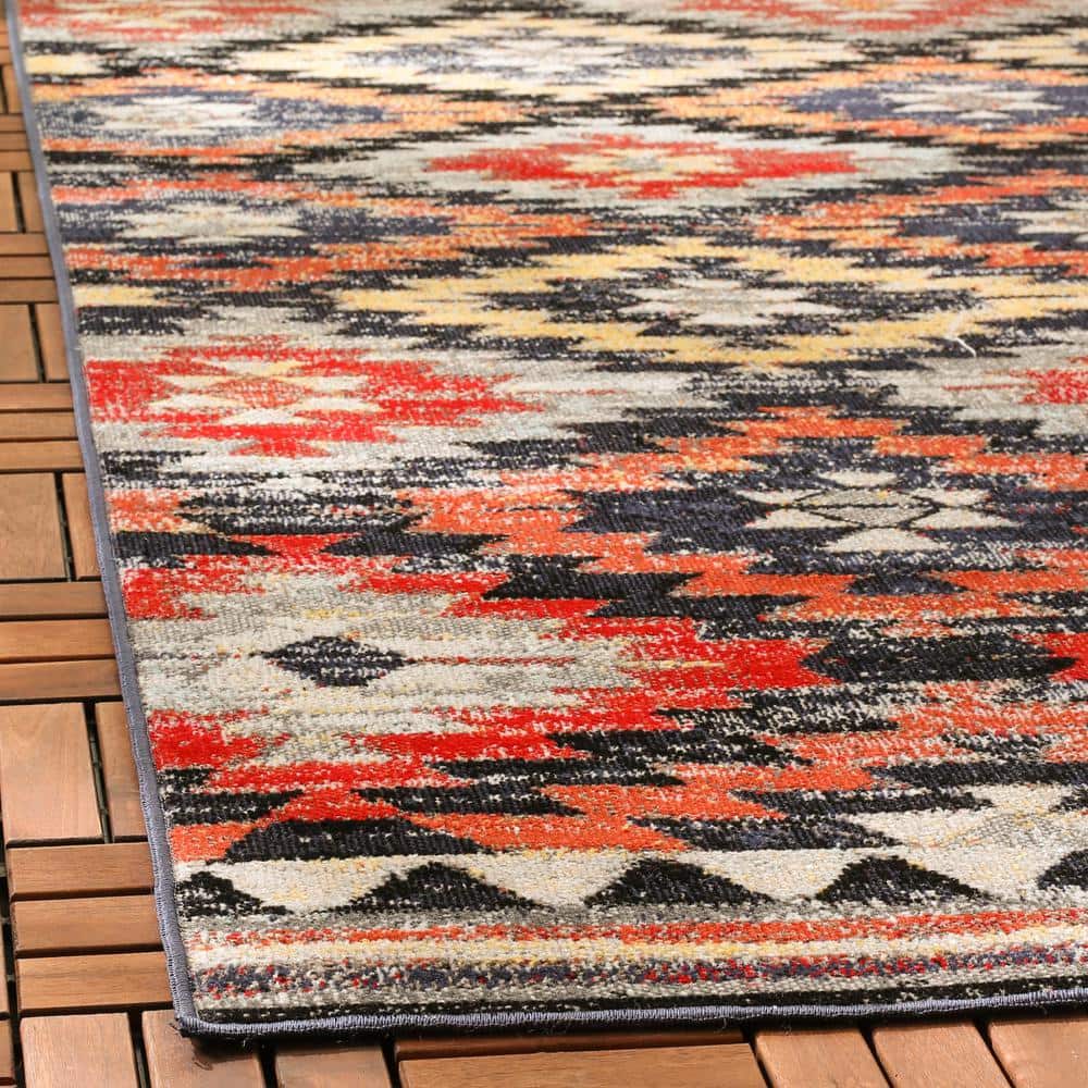 Rust and Multi Geometric 6' x 9' Synthetic Area Rug