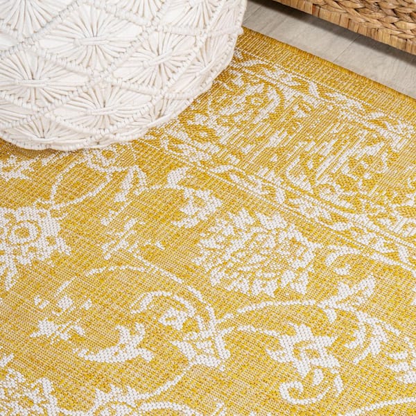 https://images.thdstatic.com/productImages/03c266c4-a6b9-4eae-842d-b2963d09c201/svn/yellow-cream-jonathan-y-outdoor-rugs-smb100e-5-66_600.jpg