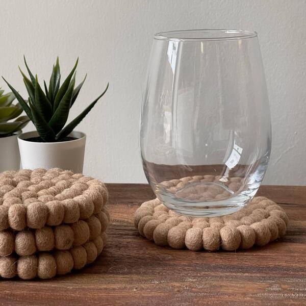 https://images.thdstatic.com/productImages/03ddf7f1-5aa4-49eb-997a-133530475b6e/svn/browns-tans-global-crafts-coasters-glg50088-s4-gwh-31_600.jpg