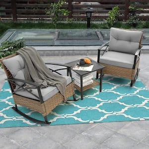 3-Piece Wicker Outdoor Rocking Chairs with Gray Cushions and Coffee Table