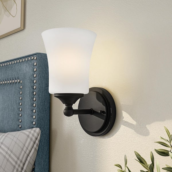 Designers Fountain Bronson 5.25 in. 1-Light Matte Black Transitional Wall Sconce with Etched Glass Shade