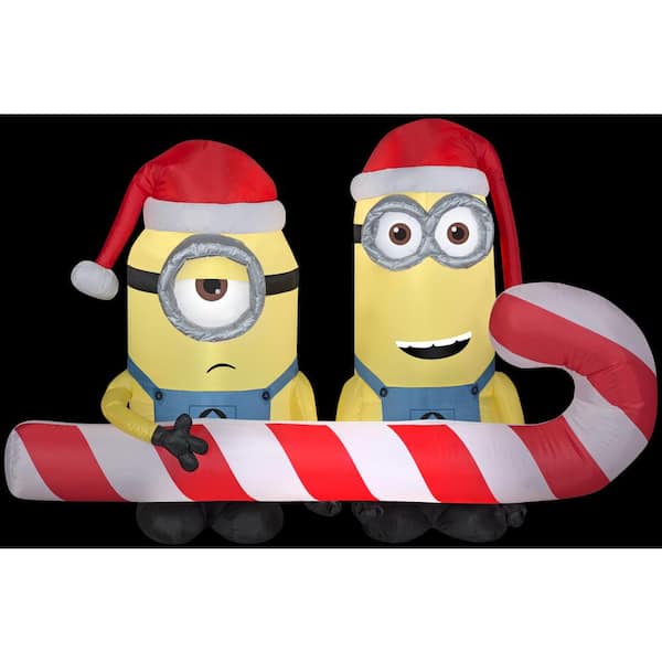 Gemmy 4.5' Airblown Minion Stuart 2024 in Santa Suit licking Candy Cane Inflatable