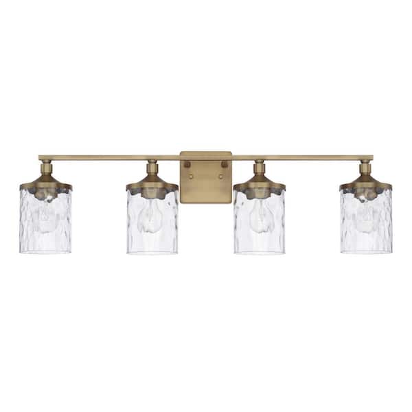 33.5 in. W x 10 in. H x 7 in. E 4-Light Clear Water Glass Vanity Light in Aged Brass