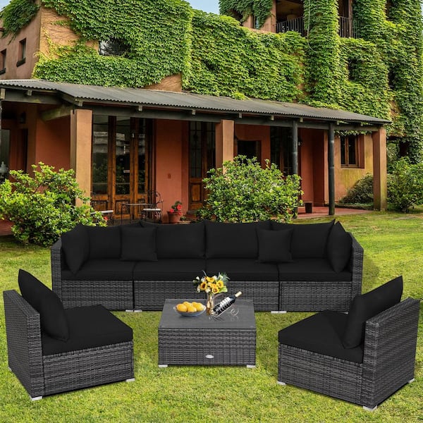 Liviza 7-Piece Outdoor Wicker Patio Conversation Set with Black Cushions and Pillows