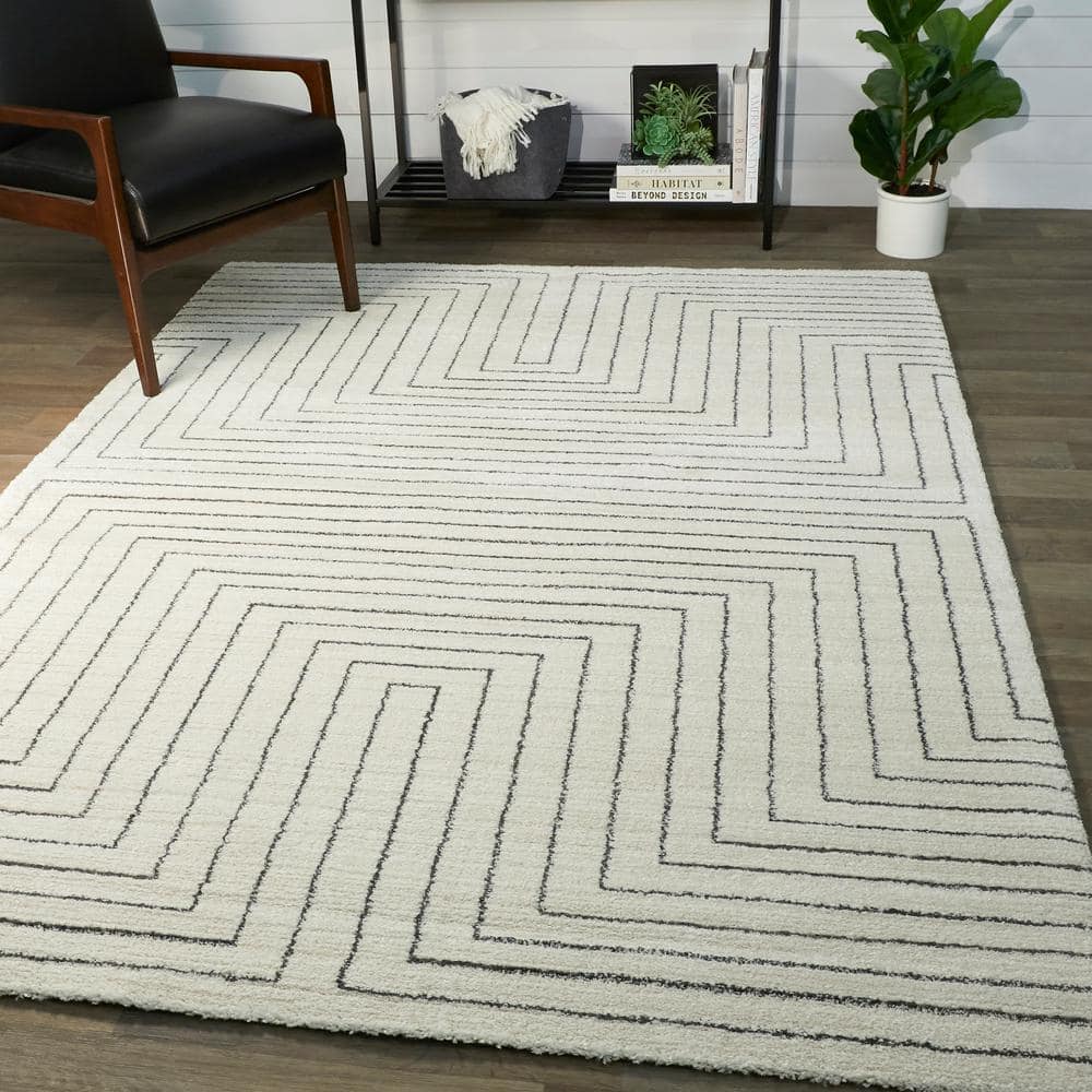 White Geometric Polyester and Polypropylene Area Rug