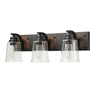 Warsaw 24 in. 3-Light Matte Black Vanity Light with Faux Wood Accents and Clear Seeded Glass Shades