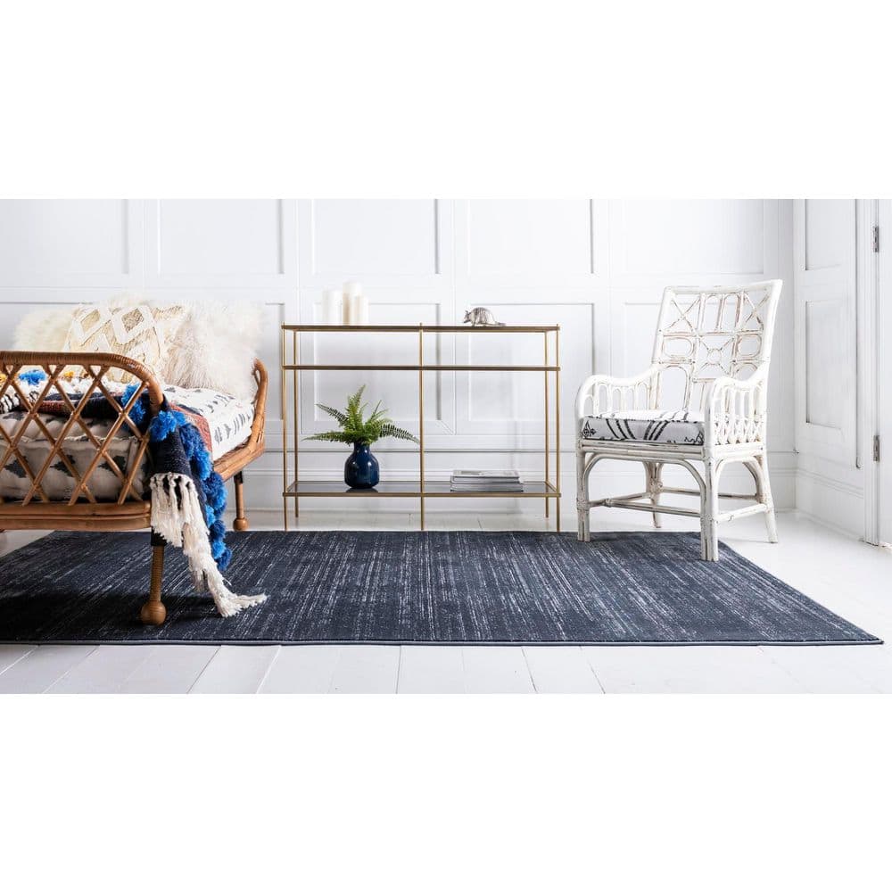 Navy Blue and Ivory 9' x 12' Easy-Care Synthetic Area Rug