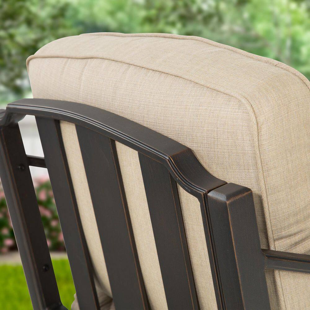 Detail of the slatted back and beige cushion