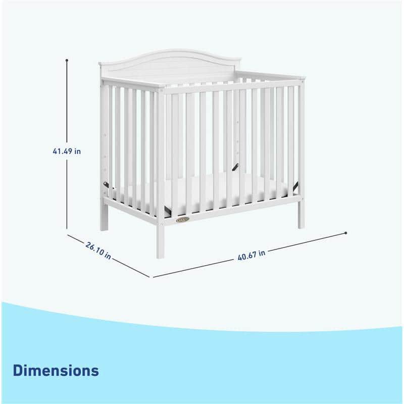 Stella White Pine Wood 4-in-1 Convertible Mini Crib with Foam Mattress
