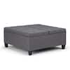 Gray square accent ottoman product shot on white background.