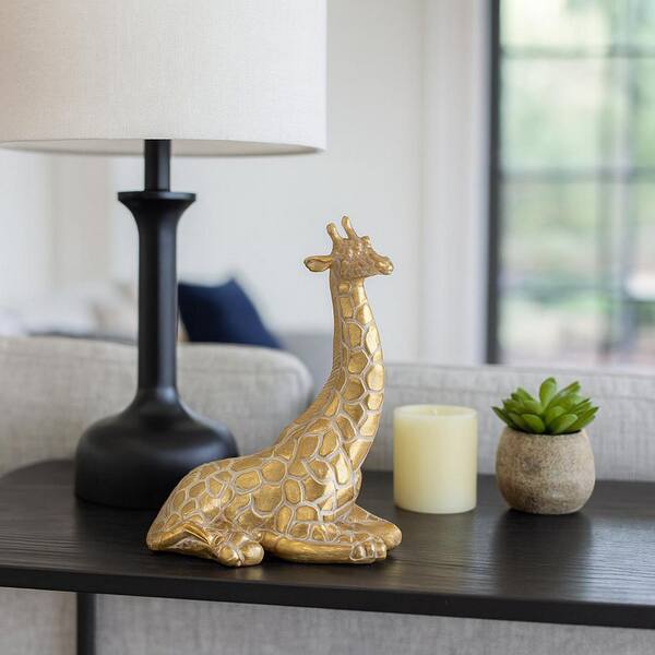 Liv & Skye Gold 8 in. x 10 in. Resin Sitting Giraffe Figurine