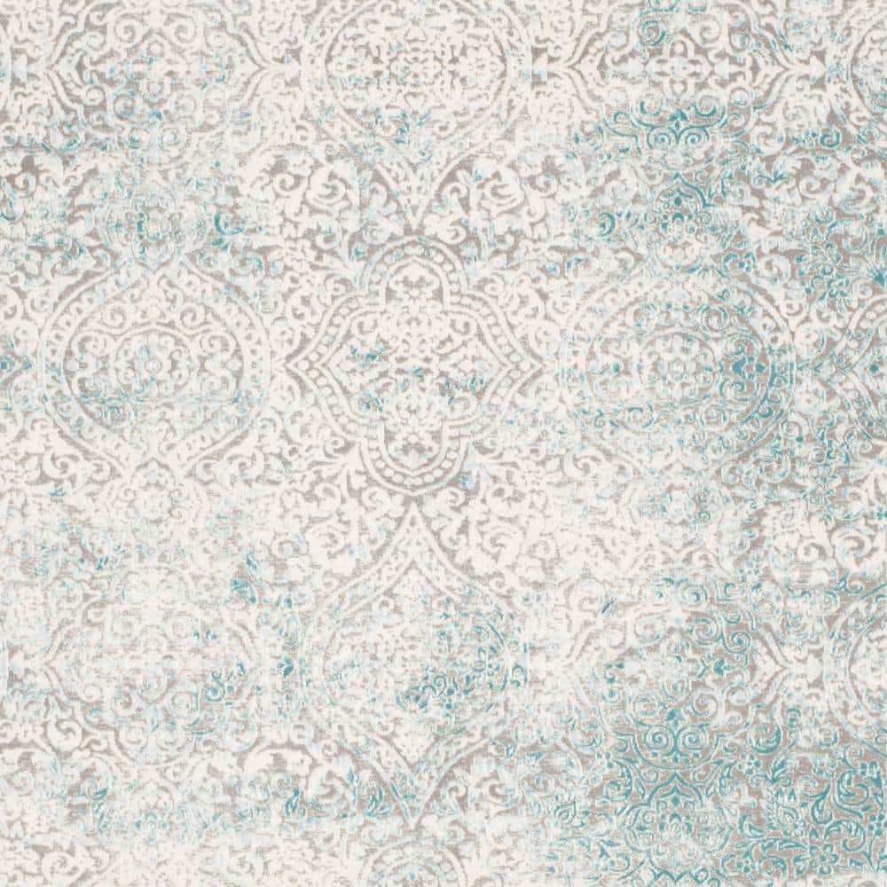 Elysian Ivory & Turquoise 9' x 12' Synthetic Reversible Area Rug