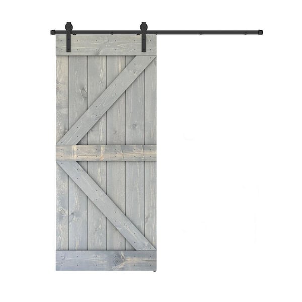 Dessliy K Series 28 in. x 84 in. Fully Set Up Made-In-USA Weather Grey Finished Pine Wood Sliding Barn Door With Hardware Kit