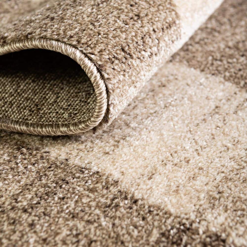 Luxe Reversible Tufted 6' x 9' Light Brown Synthetic Area Rug