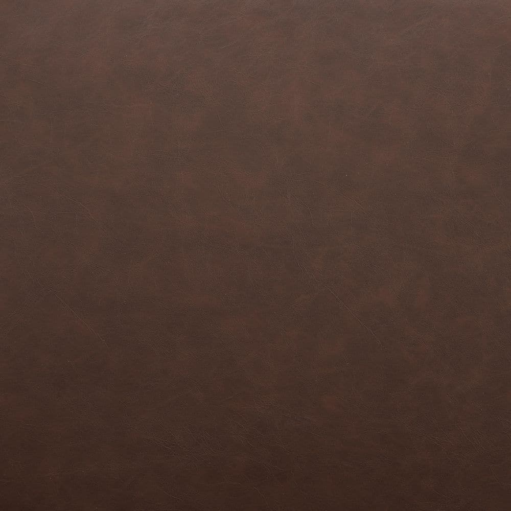 Close-up swatch of brown faux leather seat material.