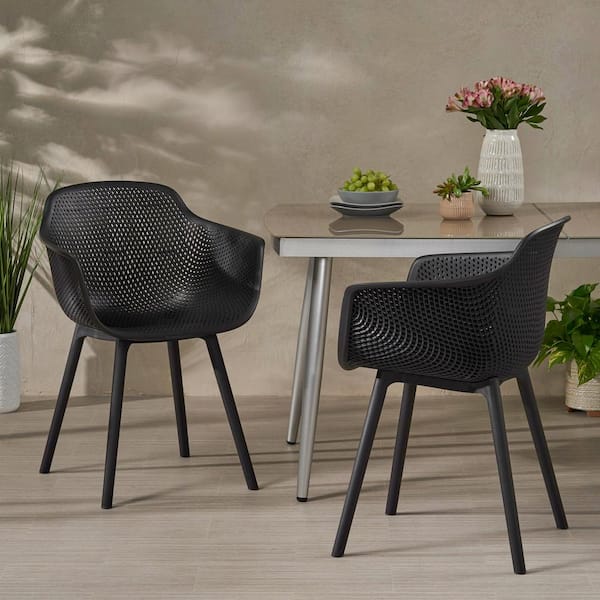 Noble House Lotus Black Curved Faux Rattan Outdoor Dining Chair (2-Pack)