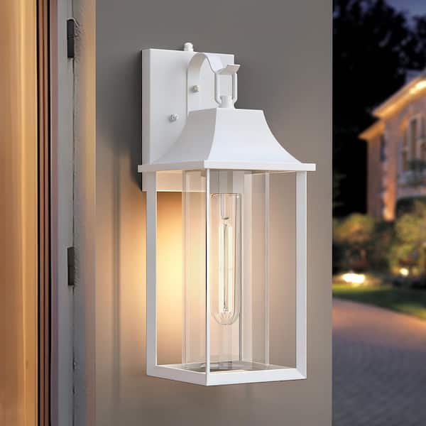 Decorators 18 in. E26 White Farmhouse Hardwired Dusk to Dawn Outdoor Sconce With Cylinder Glass