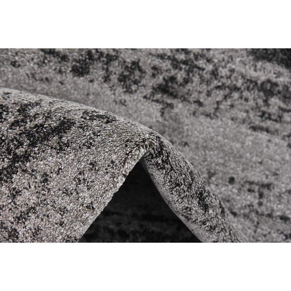 Luxurious Dark Gray Tufted 6' x 9' Easy-Care Synthetic Rug
