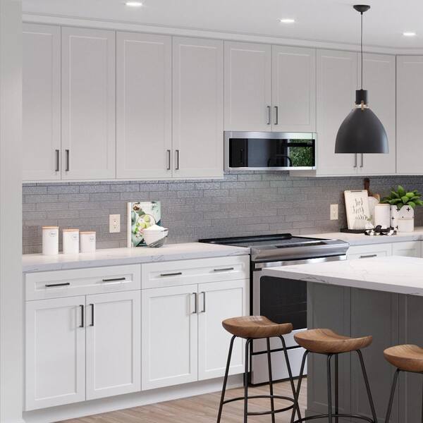https://images.thdstatic.com/productImages/05414fe0-09db-458c-9c6b-8748fe359913/svn/white-hampton-bay-assembled-kitchen-cabinets-w3630-mlwh-4f_600.jpg